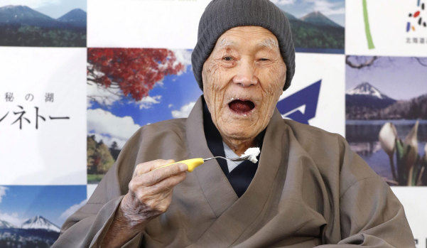Masazo Nonaka eats cake on April 10, 2018 after the Guinness World Records recognised him as the world's oldest living man at the tender age of 112 years and 259 days.