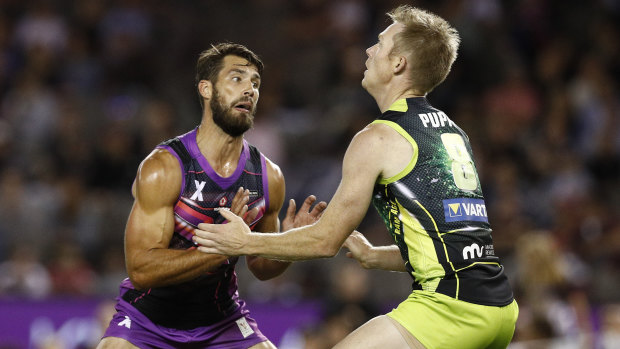 Richmond premiership teammates Alex Rance and Jack Riewoldt take each other on in Friday night's AFLX tournament.