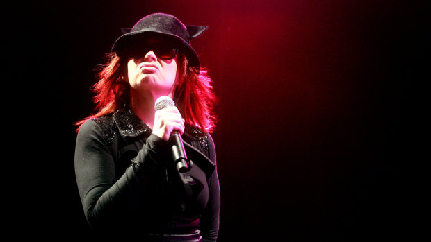 Chrissy Amphlett on stage at Homebake in 2007, wearing the hat now held at the Australian Music Vault.