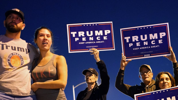 Supporters of President Donald Trump protest the Nevada vote in front of the Clark County Election Department in Las Vegas.