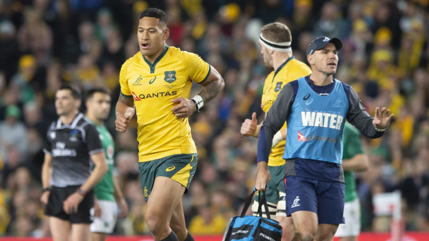 Marched: Israel Folau is given a yellow card for making contact in the air with Peter O'Mahony.
