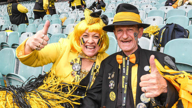 Richmond supporters Lili and Ian Robinson get an early start at the ground.