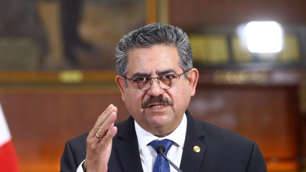 Peru's interim president Manuel Merino announces his resignation via a televised address from the Presidential Palace in Lima, Peru.