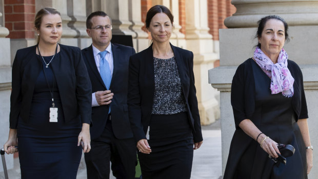 Prosecutor Carmel Barbagallo (right) leaves the Supreme Court of Western Australia on Tuesday. Ms Barbagallo is the lead prosecutor in Bradley Robert Edwards' murder trial. 