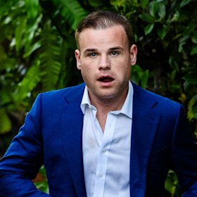 Taylor Auerbach leaves his Elizabeth Bay home before giving press conference earlier this year.