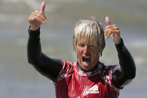 Mary Setterholm uses the Hawaiian “shaka” hand sign in California in 2007. The hand sign is sometimes known as the “hang loose” gesture associated with surf culture.