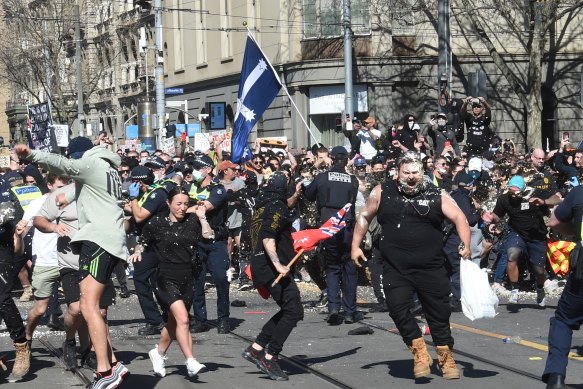 Protesters rally against lockdowns in Melbourne in August. 