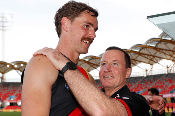 Bomber Joe Daniher and coach John Worsfold after the Bombers' last match of 2020.