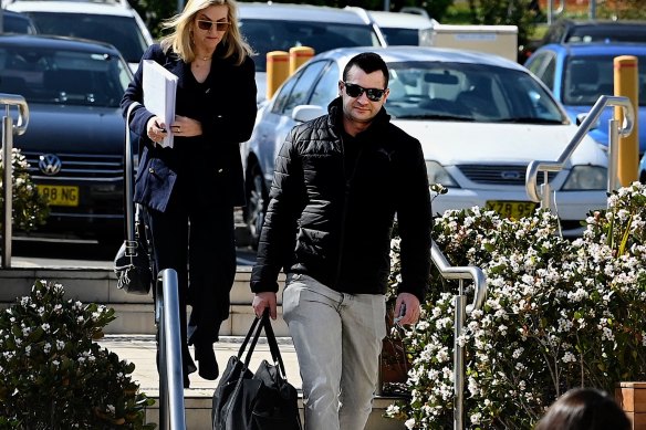 Anthony Koletti arrives at the NSW Coroners Court followed by his lawyer Judy Swan.