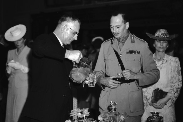The Duke of Gloucester at the reception after being sworn in as Governor General with Prime Minister John Curtin, 30 January 1945.