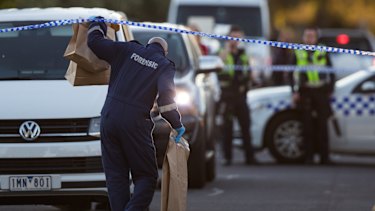 Forensic police at the scene of Mr Oksuz's death in Camplefield in May.