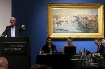 Business has never been better for Australia’s art auctioneers. This picture, taken in April, show’s Arthur Streeton’s The Grand Canal being auctioned off by Deutscher and Hackett in Melbourne.