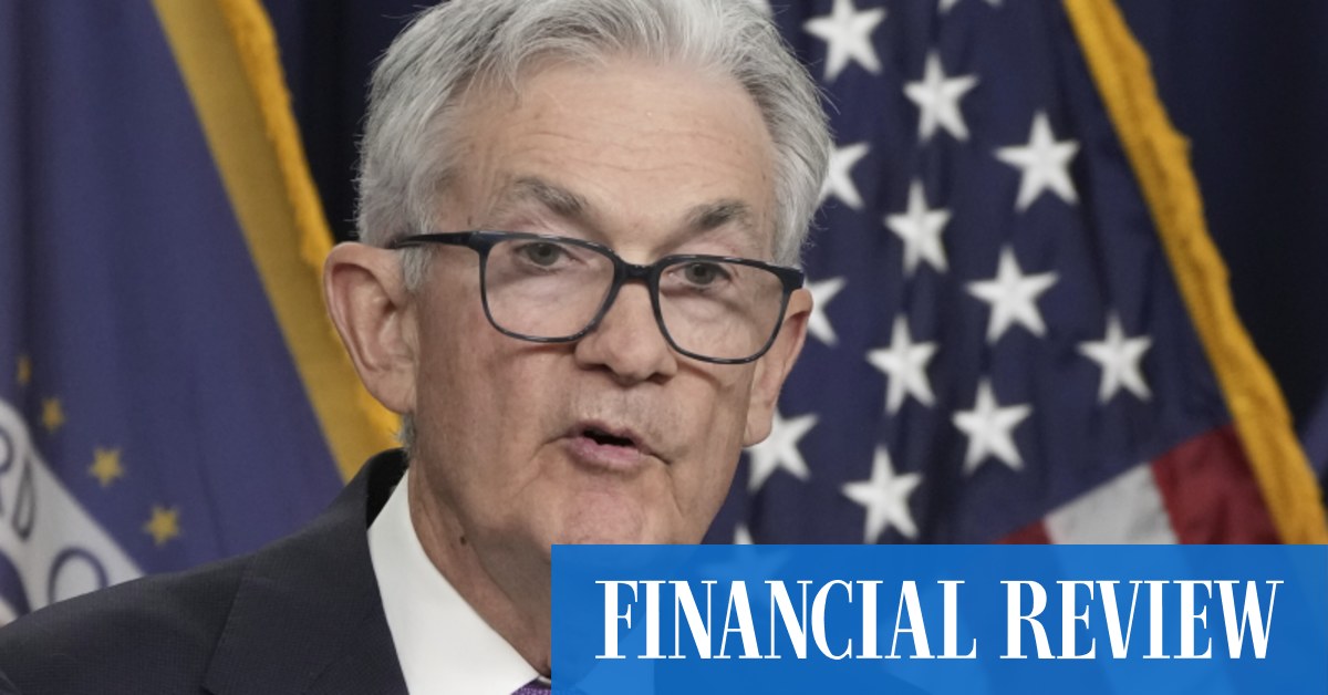 Federal Reserve holds interest rates, sees tighter policy through 2024