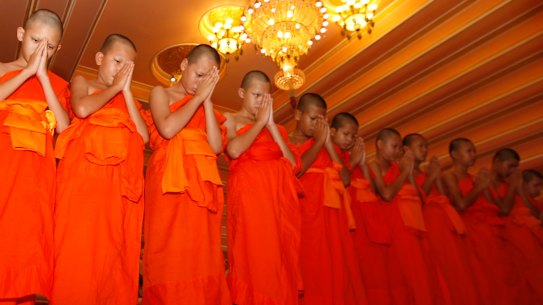 Thailand's cave boys leave Buddhist temple, but stay out of spotlight