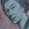 The Queen on the $5 note.