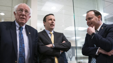 From left, Senators Bernie Sanders, Chris Murphy and Mike Lee after the Yemen vote.
