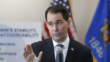 Governor Scott Walker talks about legislation he signed into law and addressed his transitional agenda as he prepares to leave office during a news conference in Green Bay, Wisconsin. 