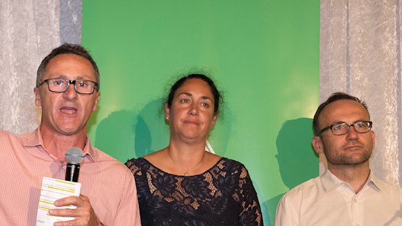 Greens leader Richard Di Natale (left), Greens candidate for Batman Alex Bhathal (centre) and deputy leader Adam Bandt concede defeat in Batman. 
