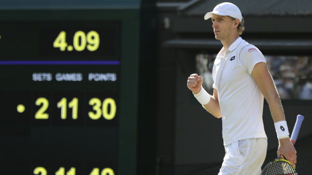 Giant killer: Towering Kevin Anderson marched into the semi-finals with his upset of Roger Federer.