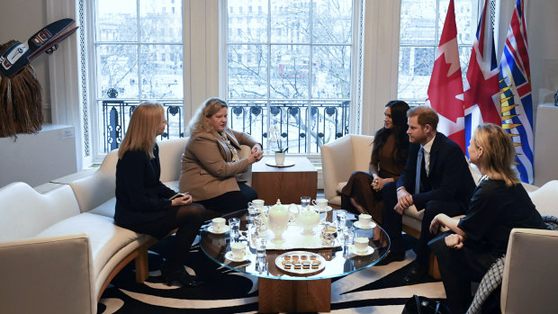 Prince Harry and Meghan talk with the High Commissioner for Canada in the UK, Janice Charette (second left) and  Deputy High Commissioner Sarah Fountain Smith (left) during their visit to Canada House in London.