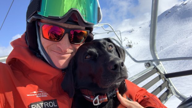 Matt O’Rourke, originally from Cooma, and avalanche-rescue dog Eva at Whistler, Canada.