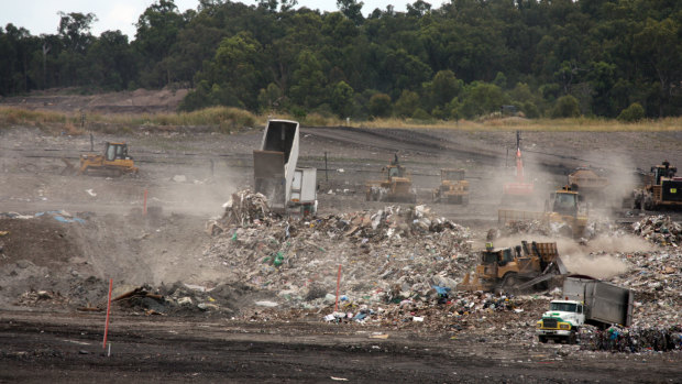 Waste trucks dump unprocessed waste in Ipswich.