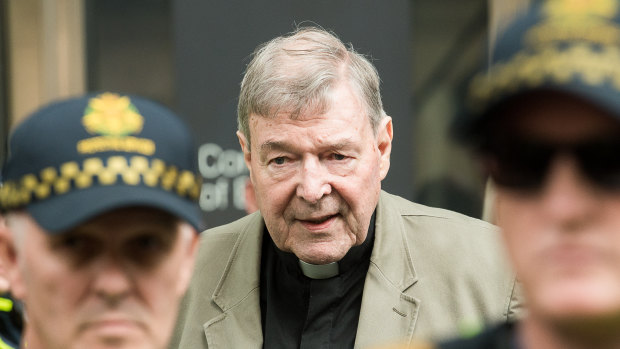 Cardinal George Pell leaving the County Court where was found guilty of historic sexual offenses.