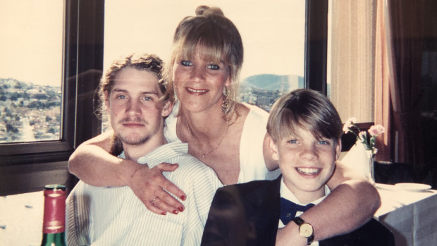 Brett Thomas (left) during his teenage years with his mother and brother.