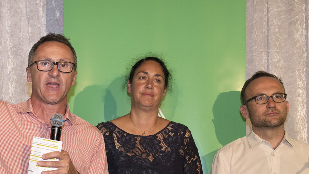 Greens leader Richard Di Natale (left), Greens candidate for Batman Alex Bhathal (centre) and deputy leader Adam Bandt concede defeat in Batman. 