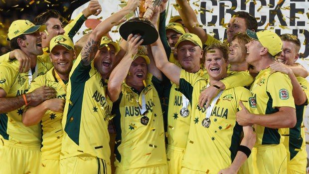 Reigning champs: The Australian team celebrate their win in the 2015 World Cup, a feat Darren Lehmann believes they can repeat.