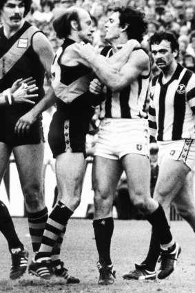 Richmond's Kevin Bartlett and Collingwood's Stan Magro clash in the 1980 grand final.