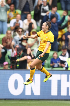 Caitlin Foord celebrates after scoring a goal. 