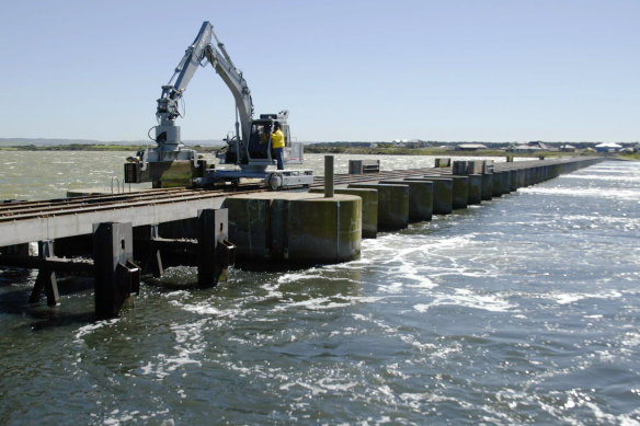 Gates of the Goolwa barrage near the mouth of the Murray River in South Australia. The barrages were first  installed in the late 1930s and 1940s.