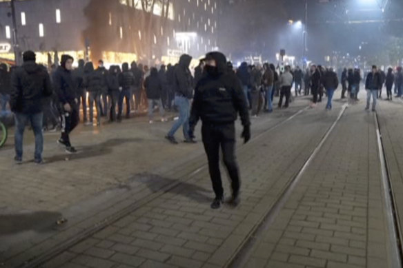 Demonstrators in Rotterdam protest against government restrictions