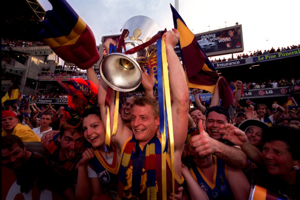 Michael Voss celebrates the Lions’ premiership in 2001.