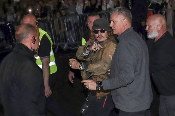 Johnny Depp leaves the Sage concert venue after performing with Jeff Beck in Gateshead, England, in June.