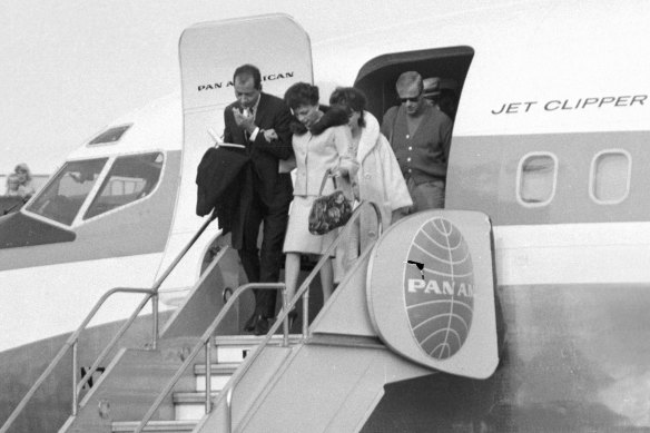 Judy Garland and her entourage arrive at Mascot Airport.