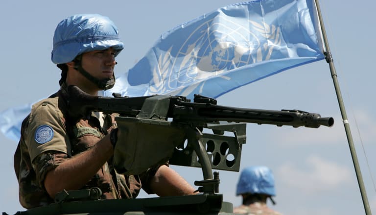 An Italian soldier arrives in the Lebanese port city of Tyre on a UN peacekeeping mission in 2006.