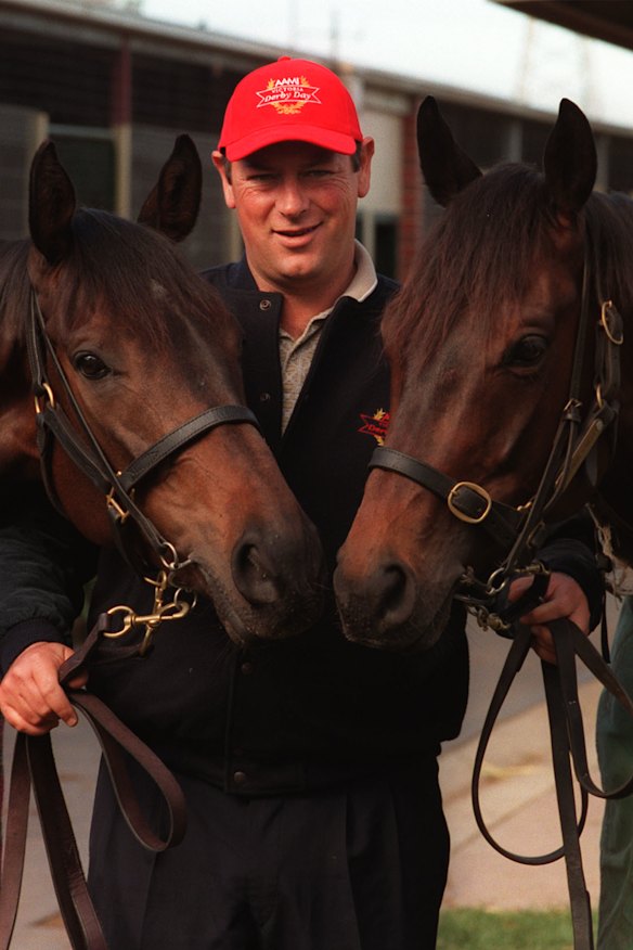 Michael Moroney with Melbourne Cup winner Brew, left, and third-place getter Second Coming.