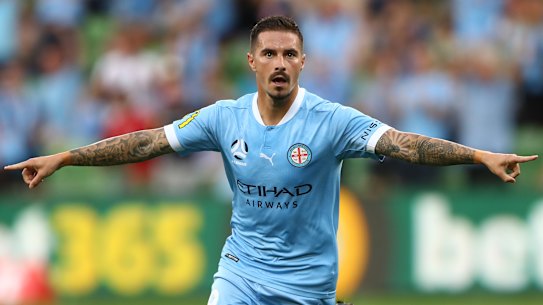 City’s Jamie Maclaren celebrates after scoring a goal against Macarthur at AAMI Park on Friday night.
