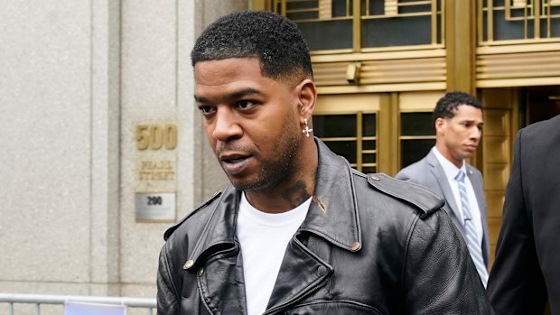 Rapper Kid Cudi leaves court after testifying at the trial of Sean “Diddy” Combs in New York on Thursday.