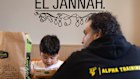 A family shares a meal at El Jannah in Randwick.