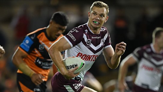Tom Trbojevic on his way to the try line on Thursday night against the Tigers.