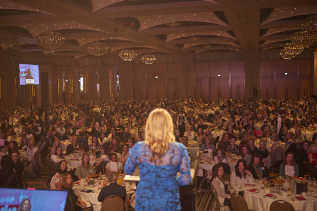 Emma Isaacs speaks at a Business Chicks event in Melbourne: “The events are joyful,” says one member, “like school reunions without the mean girls.”