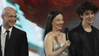 Yura Borisov, Mikey Madison and Mark Eydelshteyn at the Screen Actors Guild Awards in Los Angeles.