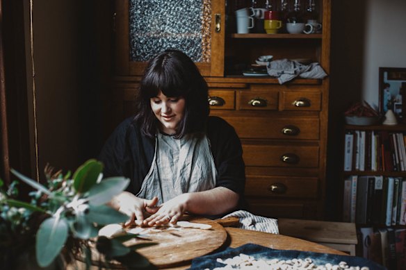 Julia making pasta at home in 2018.