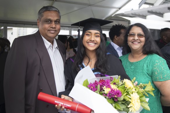 Rose Lewis with parents at her graduation from Western Sydney University.