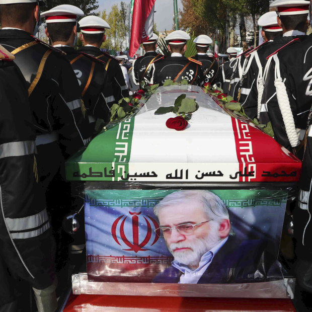 The Iranian Defence Ministry, military personnel stand near the flag-draped coffin of Mohsen Fakhrizadeh, a scientist who was killed on Friday, during a funeral ceremony in Tehran, Iran.