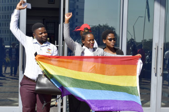 Activists celebrate outside the High Court in Gaborone, Botswana after the country became the latest country to decriminalise gay sex.