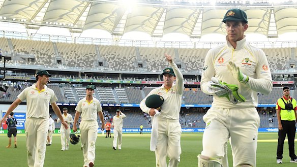Victory in sight: Australian captain Tim Paine leads his men off the field on day four.